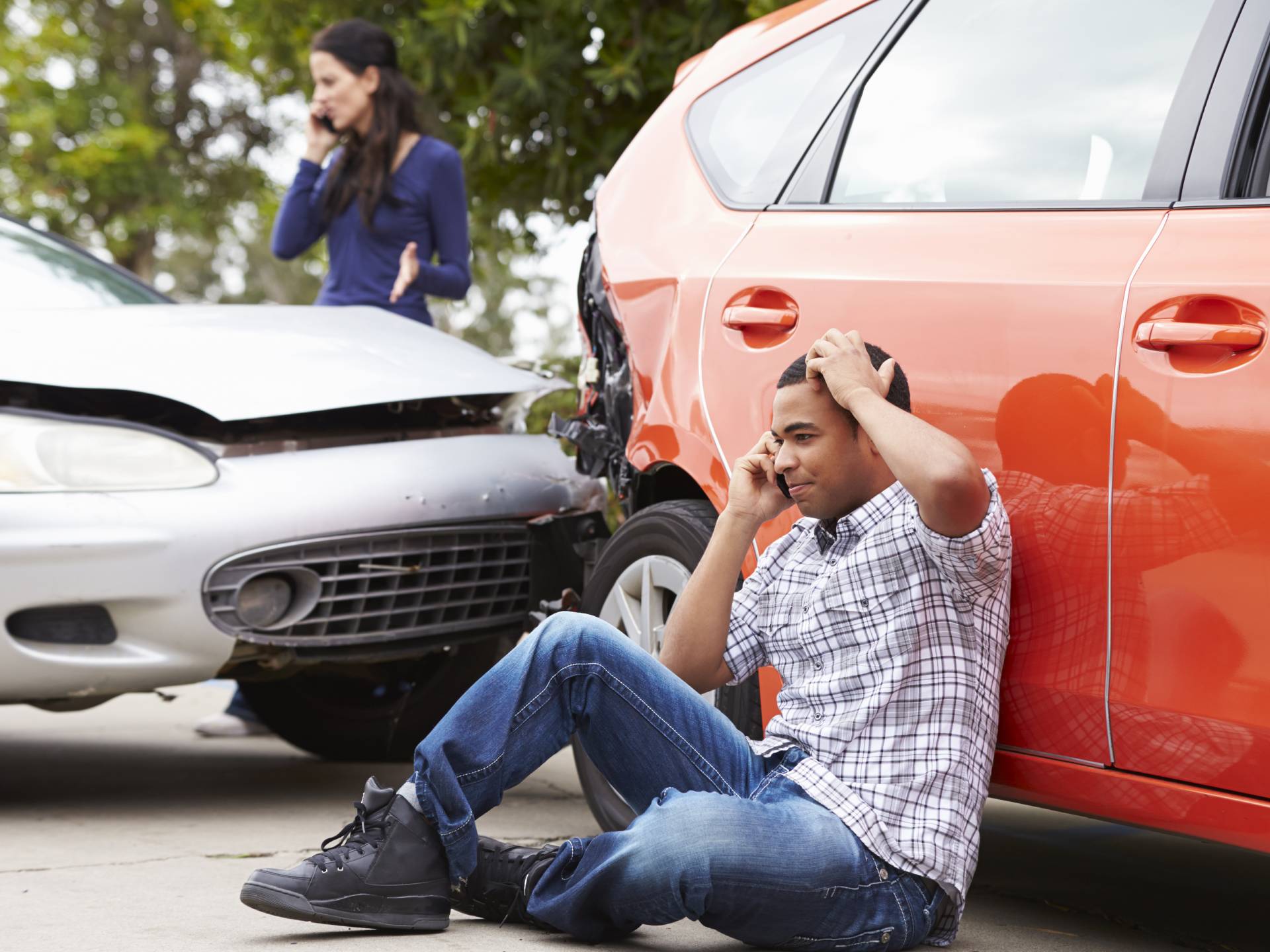Male Driver Making Phone Call After Traffic Accident