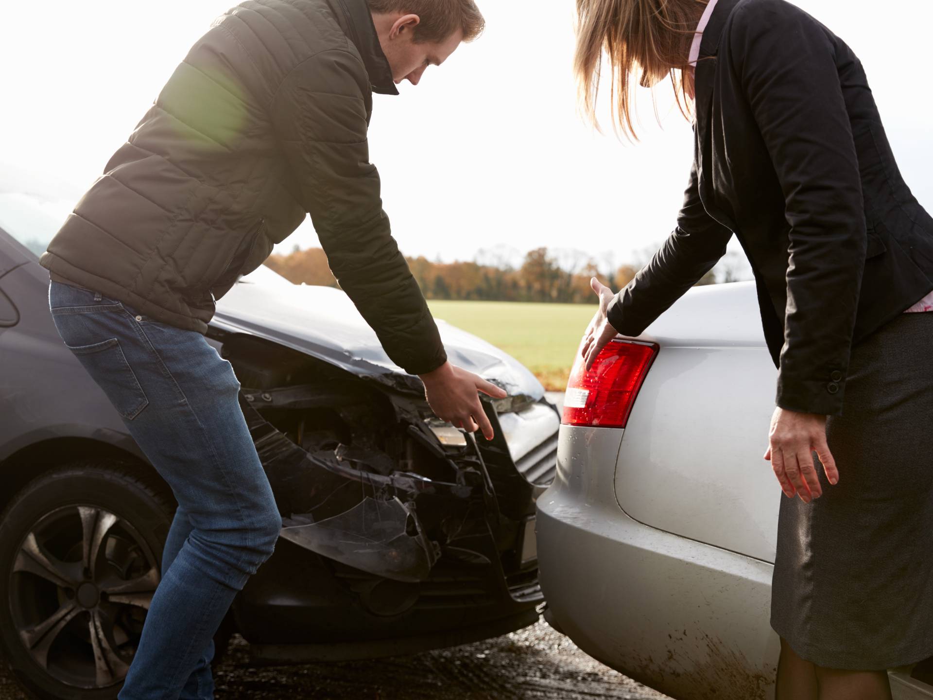 Two Drivers Arguing Over Damage To Cars After Accident